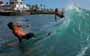 Surfing and bodyboarding on Derecha and Izquierda in Las Americas Tenerife