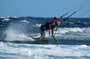 Windsurfing and kitesurfing at Muelle Harbour Wall in El Medano Tenerife