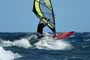 Windsurfing and kitesurfing at Muelle Harbour Wall in El Medano Tenerife
