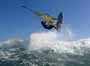 Wave riding and back looping at Playa Sur in El Medano