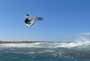 Wave riding and back looping at Playa Sur in El Medano