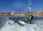 Wave riding and back looping at Playa Sur in El Medano