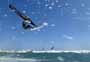 Wave riding and back looping at Playa Sur in El Medano