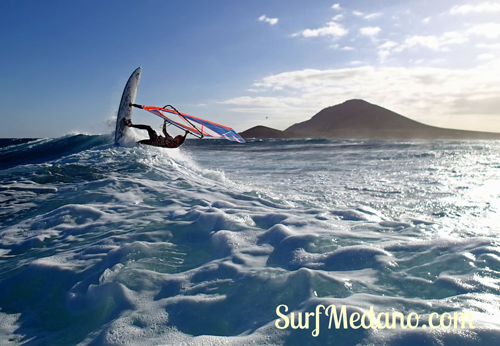 Wave riding at Harbour Wall aka Muelle in El Medano Tenerife