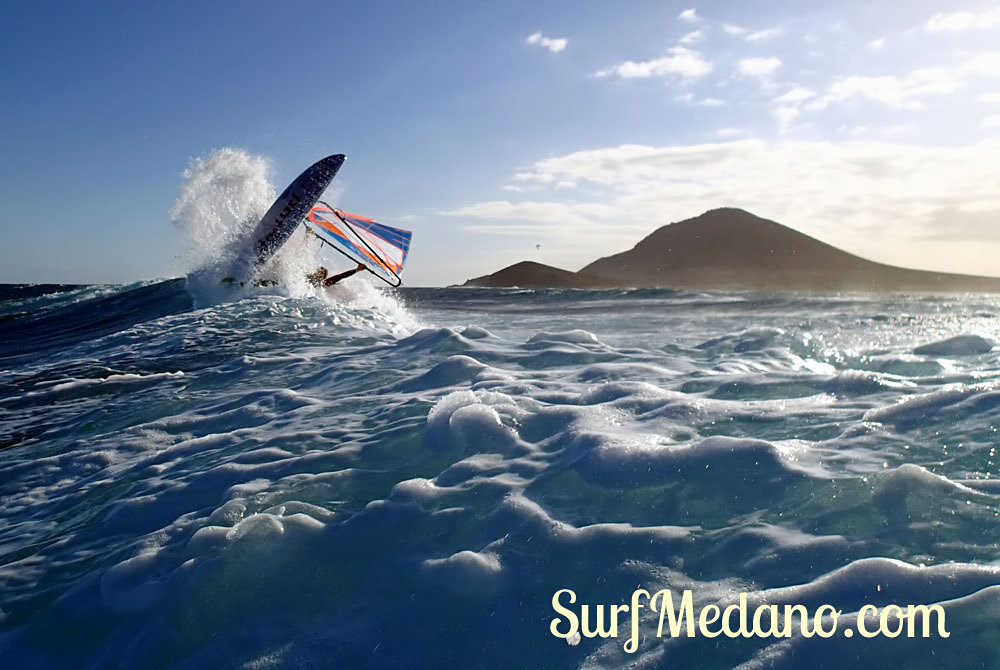 Wave riding at Harbour Wall aka Muelle in El Medano Tenerife