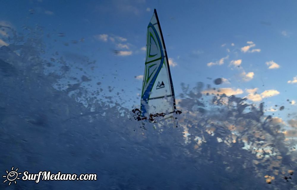 Sunset windsurfing at Harbour Wall in El Medano